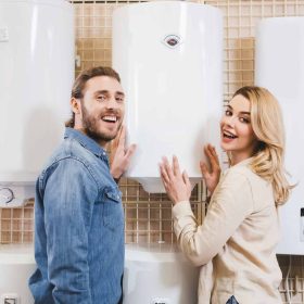 smiling-boyfriend-and-girlfriend-touching-boiler-in-home-appliance-store.jpg